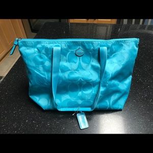 Coach weekend travel cosmetic bag. Blue
